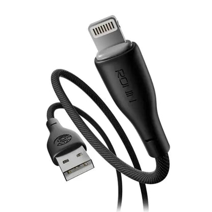 A black braided USB cable with a Lightning connector, featuring a black plastic inline adapter with the brand name 'ROK' printed vertically on it, shown against a plain white background.